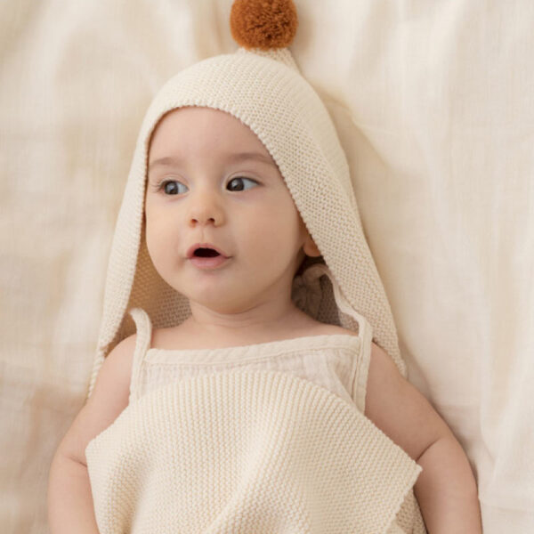 nobodinoz-So-Natural-knitted-baby-cape-natural-2